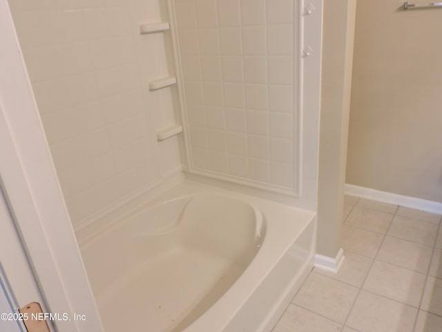 bathroom featuring tile patterned floors and shower / washtub combination