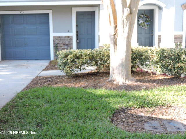 property entrance featuring a garage