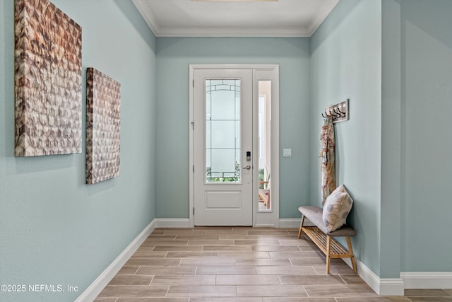 foyer featuring ornamental molding