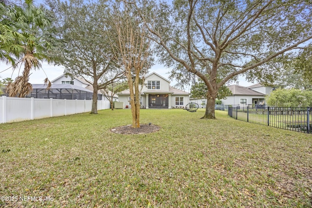 view of yard featuring a sunroom