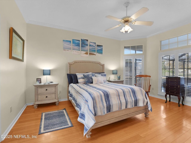 bedroom featuring ceiling fan, light hardwood / wood-style flooring, and crown molding