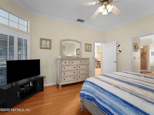 bedroom with ceiling fan, ornamental molding, and light hardwood / wood-style flooring