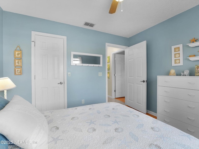 bedroom featuring ceiling fan