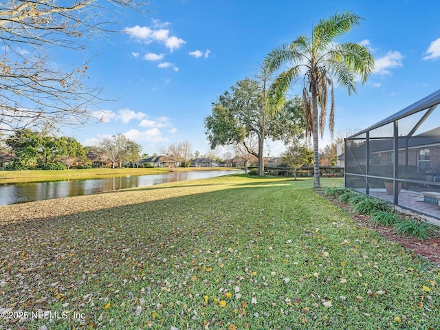 view of yard with a water view