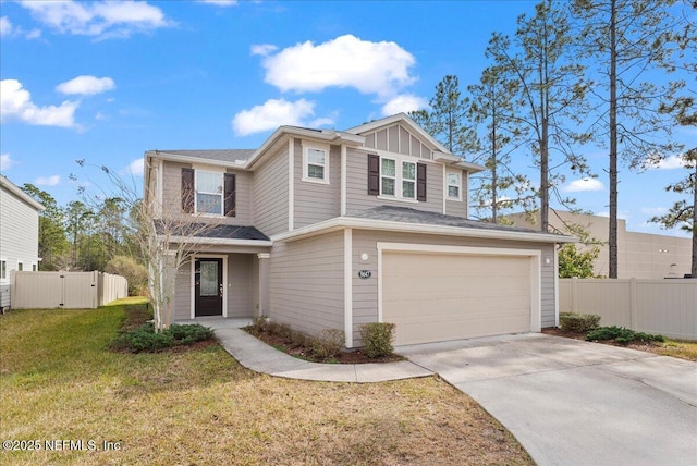 view of front facade with a front lawn and a garage