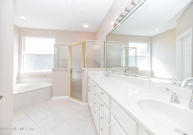 bathroom featuring vanity, separate shower and tub, and tile patterned floors