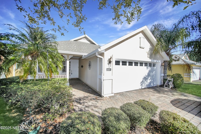 single story home featuring a garage