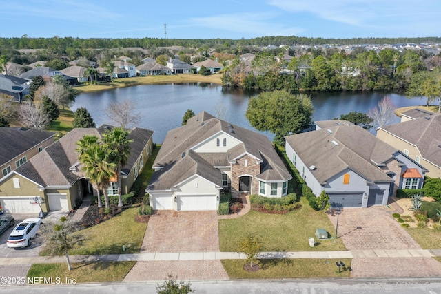 drone / aerial view with a water view