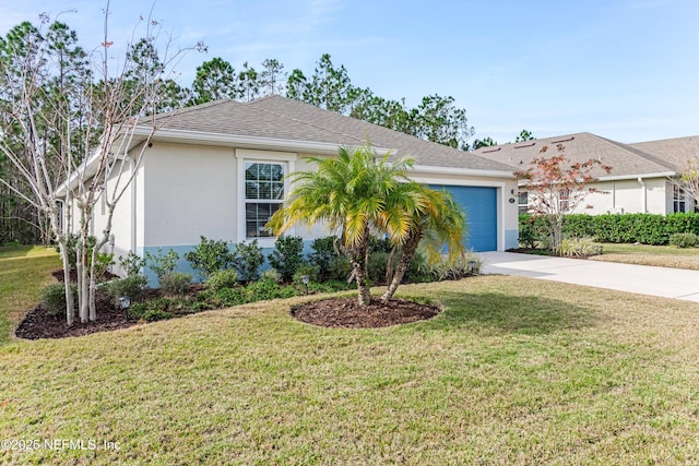 ranch-style home featuring a garage and a front yard