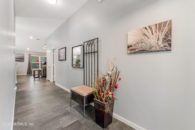 corridor featuring hardwood / wood-style floors