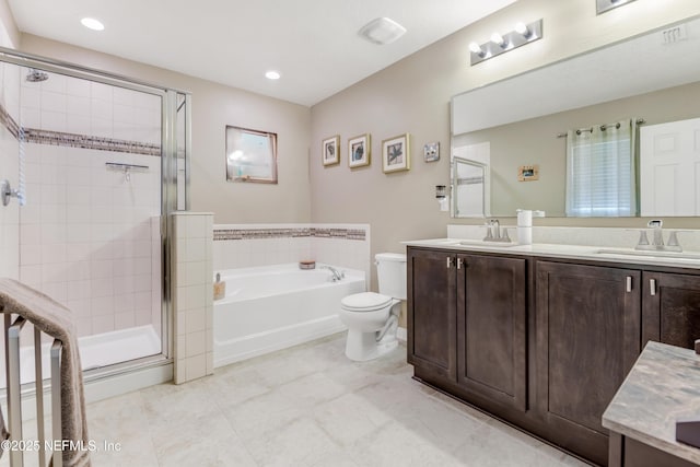 full bathroom with vanity, toilet, independent shower and bath, and tile patterned flooring