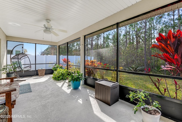 sunroom / solarium with ceiling fan