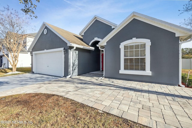 view of front of home with a garage