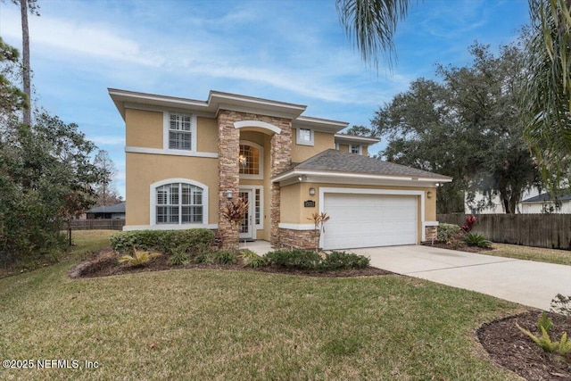 view of front facade featuring a garage and a front lawn