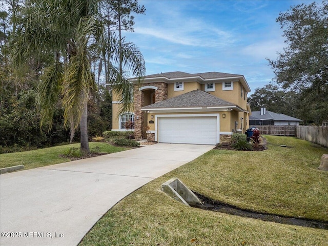 view of front facade featuring a garage and a front lawn