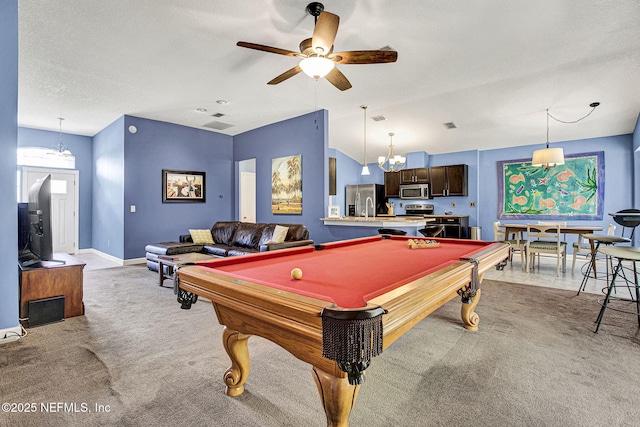 playroom with light carpet, vaulted ceiling, a textured ceiling, ceiling fan, and baseboards