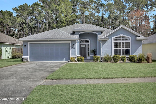 single story home featuring roof with shingles, stucco siding, a garage, driveway, and a front lawn