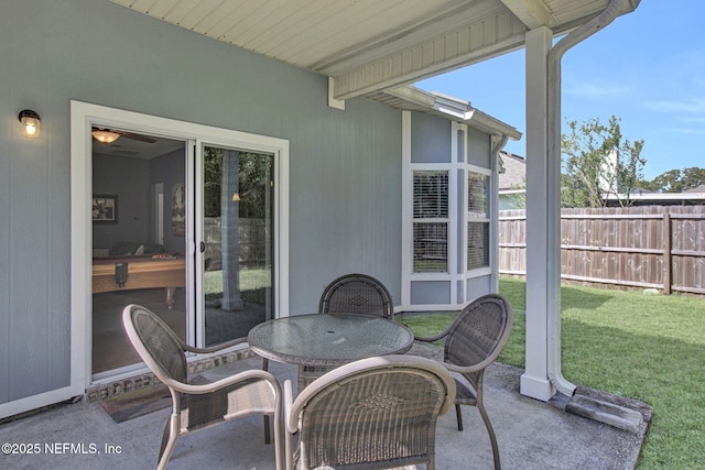 view of patio with fence