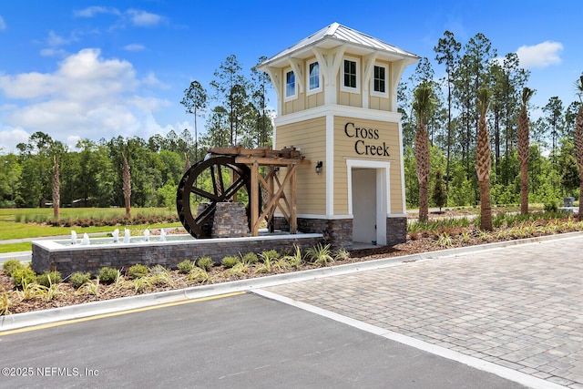 view of community sign