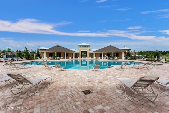 view of swimming pool featuring a patio area