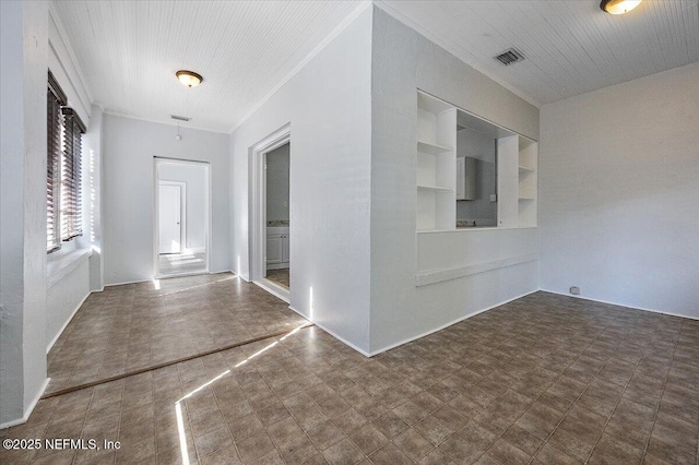 interior space featuring ornamental molding, wooden ceiling, and built in shelves