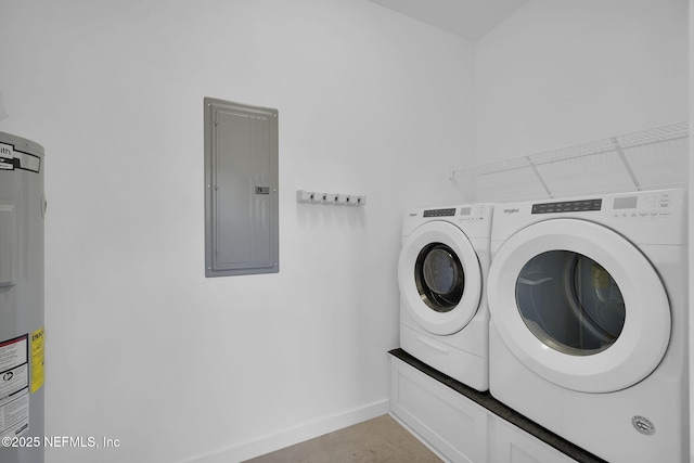 washroom featuring electric water heater, electric panel, and independent washer and dryer