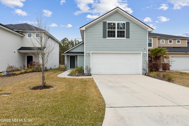 view of front property with a front yard and a garage