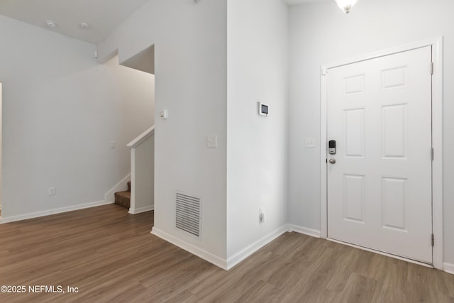 entrance foyer featuring hardwood / wood-style flooring