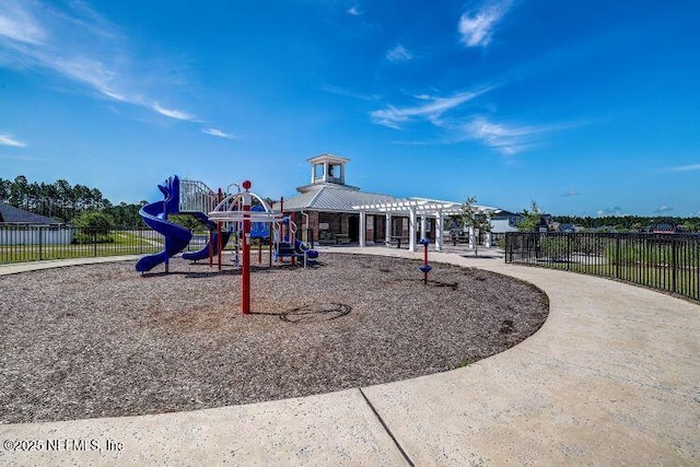 view of playground featuring a pergola