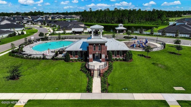 view of swimming pool featuring a gazebo and a yard