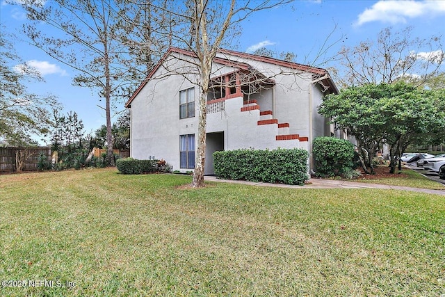 view of front facade with a front yard