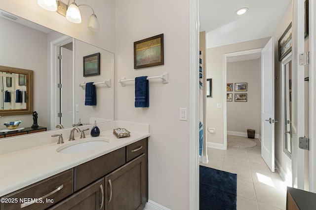 bathroom with vanity and tile patterned flooring