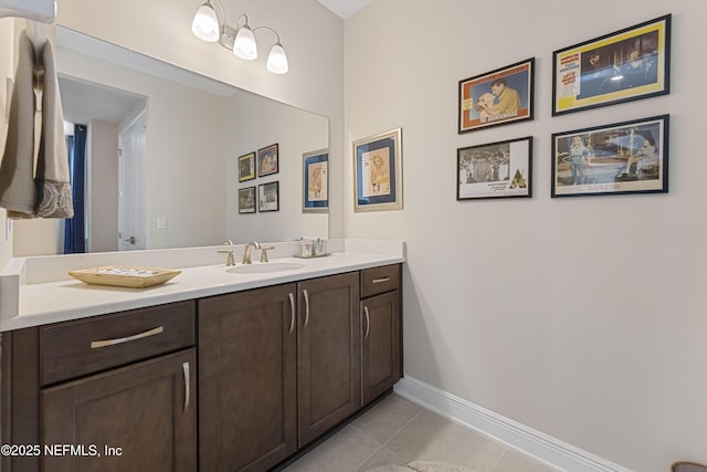 bathroom with tile patterned flooring and vanity