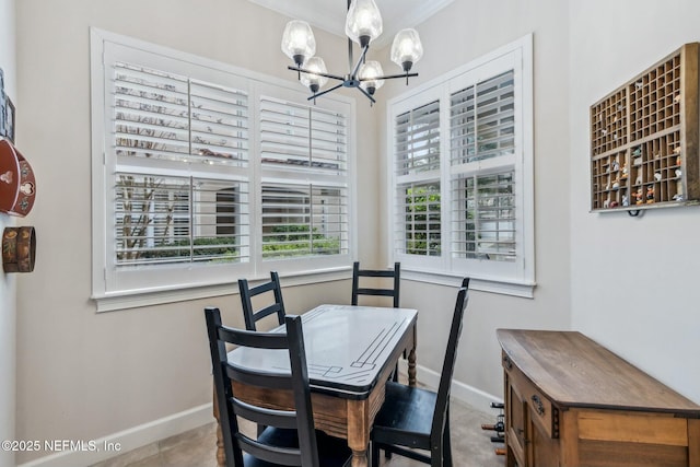 dining space with an inviting chandelier