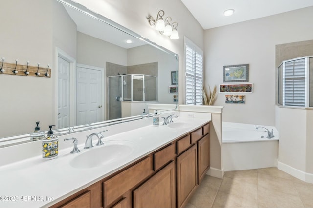 bathroom featuring separate shower and tub, tile patterned floors, and vanity