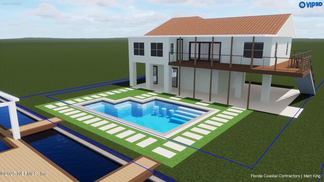 8851 S A1A, Saint Augustine, FL 32080 - back of house featuring a balcony, a patio area, stucco siding, and an outdoor pool