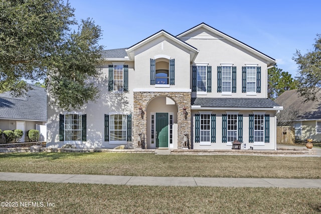 view of front facade with a front lawn