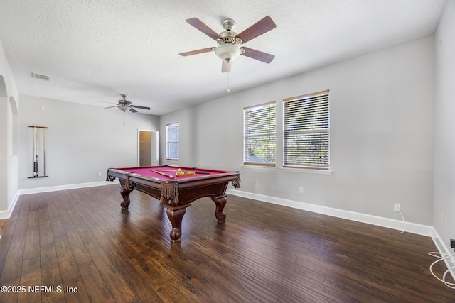 recreation room with dark wood-type flooring, billiards, ceiling fan, and a textured ceiling