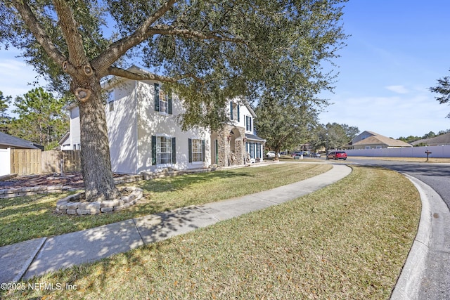 view of front of home with a front yard