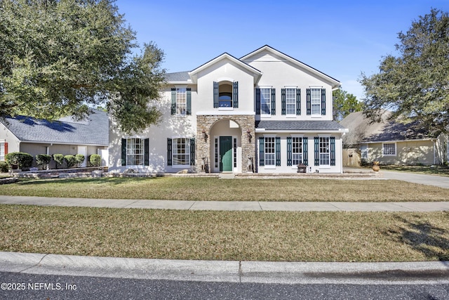 view of front of property with a front lawn