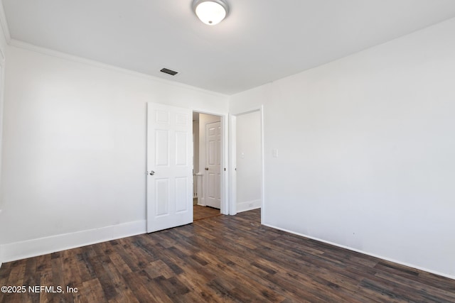 empty room featuring dark hardwood / wood-style floors