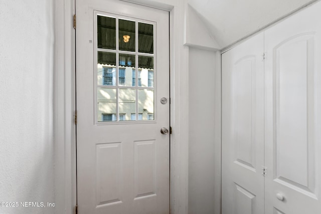 entryway with lofted ceiling