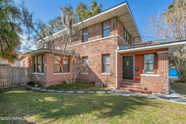 view of front of home featuring a front lawn