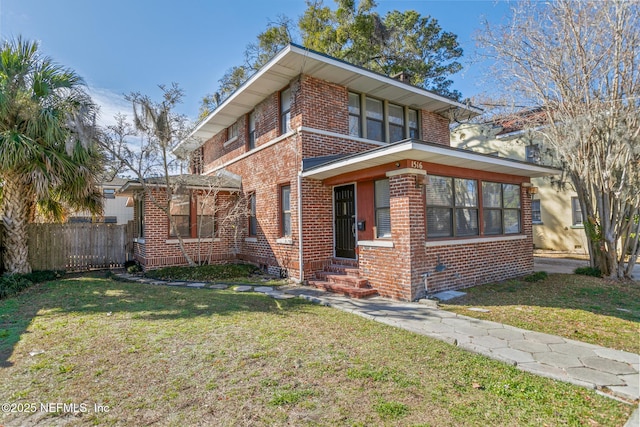 view of front of house with a front lawn