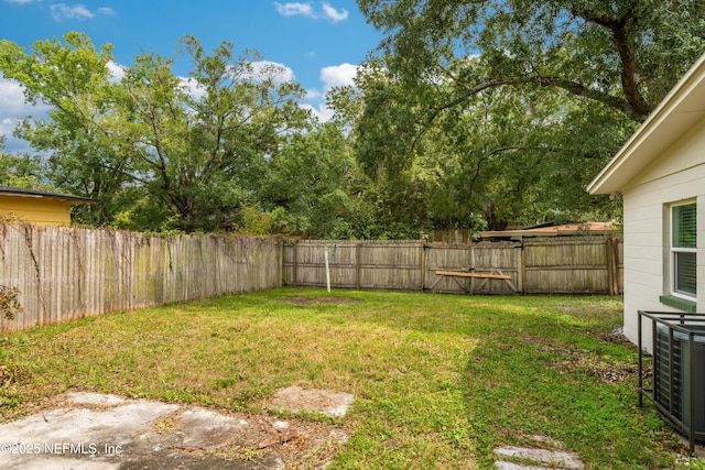 view of yard featuring central AC unit