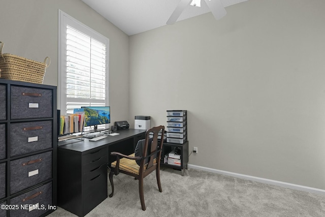 office space with light colored carpet and ceiling fan