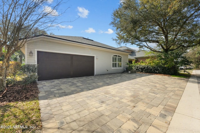 exterior space featuring a garage