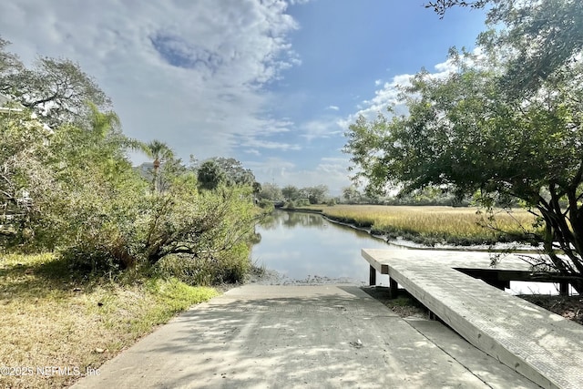 view of dock with a water view