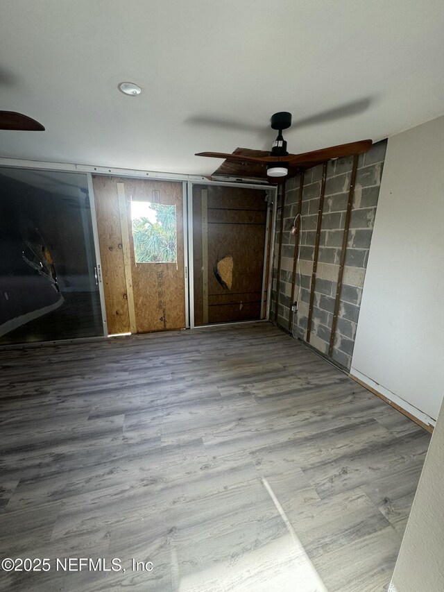 5500 Ocean Shore Blvd Unit 61, Ormond Beach, FL 32176 - unfurnished bedroom featuring wood finished floors