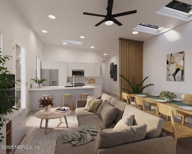 living room featuring sink, ceiling fan, and vaulted ceiling